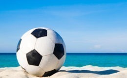 Soccer ball on a beach